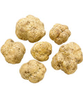 Big fresh Tuber magnatum white truffles with pale ochre surfaces and natural shape variation